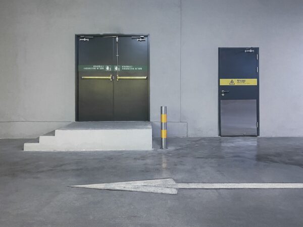 Crash doors leading away from an elevated loading zone.