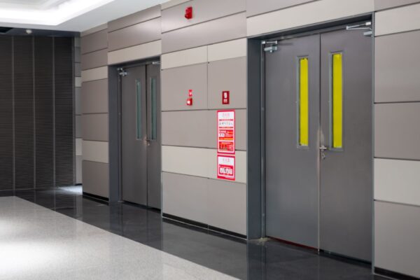 Windowed commercial doors in an administrative setting.